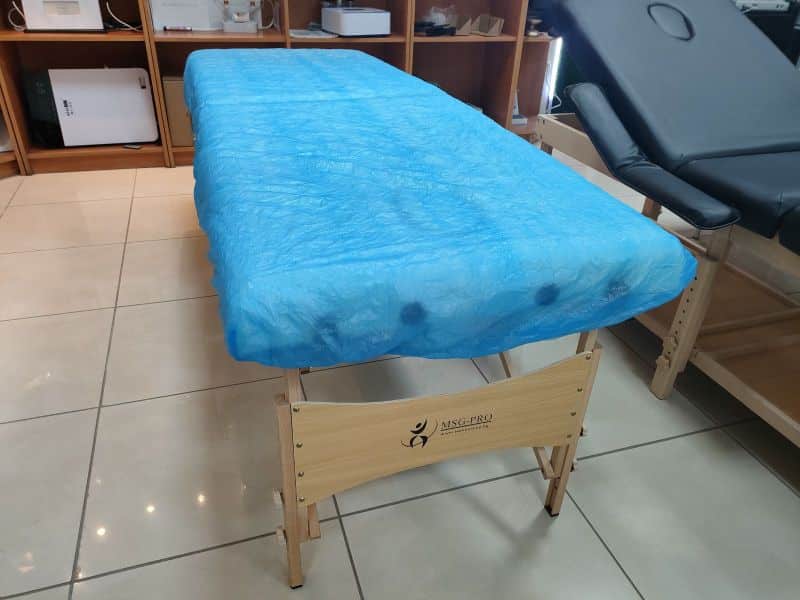 Еднократни чаршафи за масажна кушетка с ластик- син, CPE, 55g – снимка 6
